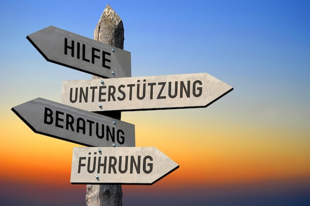 Help support advice guidance in German wooden signpost