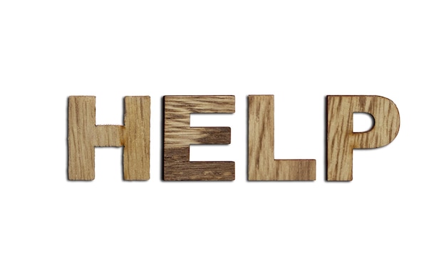 Help word written in wooden alphabet letters isolated Concept of support and assistance to people escaping from war Top view Copy space