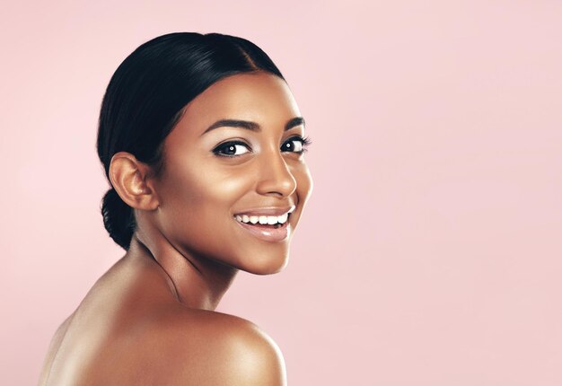 Her beauty is clear for all to see Studio portrait of a beautiful young woman posing against a pink background