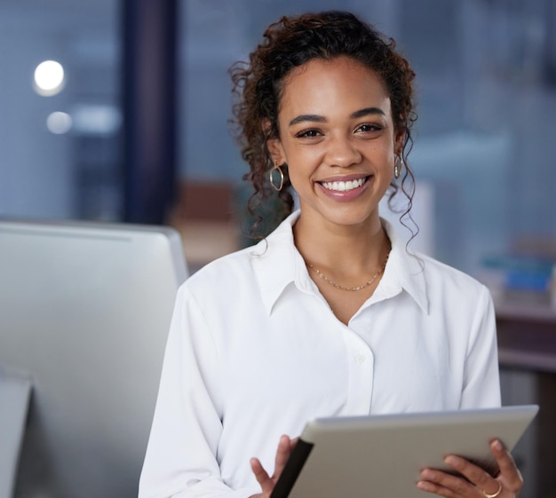 Her tablet helps her a lot Shot of a young businesswoman using a digital tablet at work