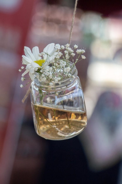 Herbal tea bottle hanging on string