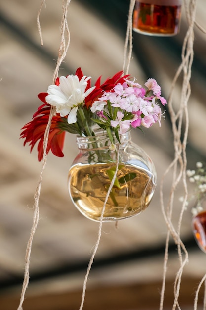 Herbal tea bottle hanging on string