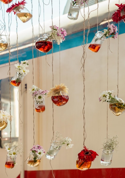 Herbal tea bottles hanging on strings