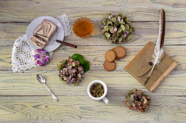 Herbal tea and confection on a wooden table