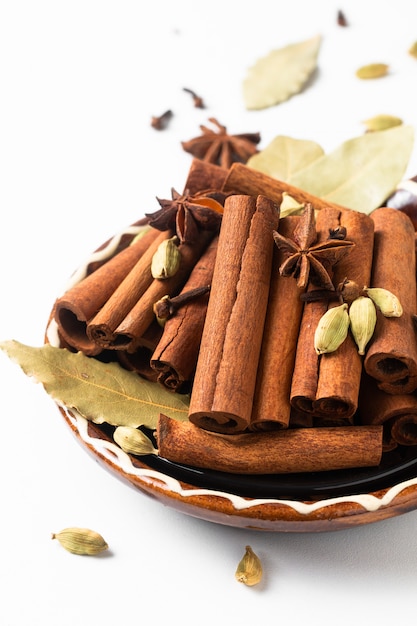 Herbs and spices in brown handle ceramic bowl