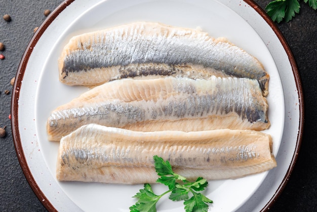 herring fish fillet Norwegian fresh seafood meal snack on the table copy space