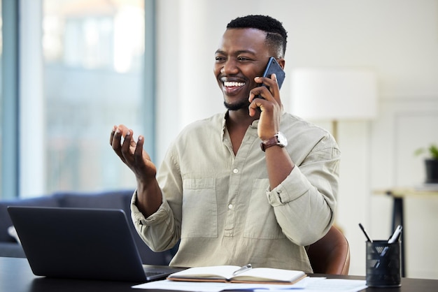 Hes got connections Shot of a young businessman on a call at work