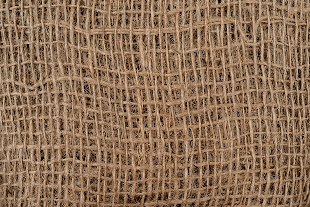 Hessian sackcloth burlap woven texture background Cotton woven fabric close up with flecks