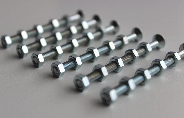 Hex Nuts On A Threaded Hex Bolts Angle View With Soft Focus Stock Photo