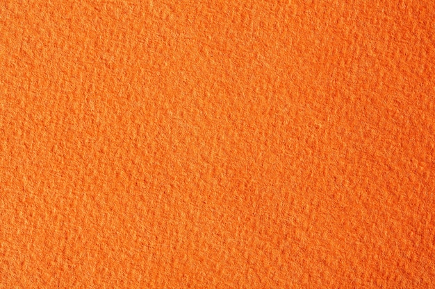 Hi res texture from orange paper. High resolution photo.