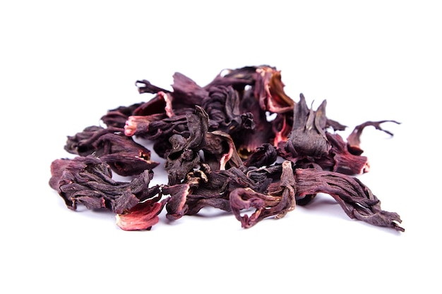 Hibiscus flower red tea karkade dried petals of Sudanese rose isolated on white