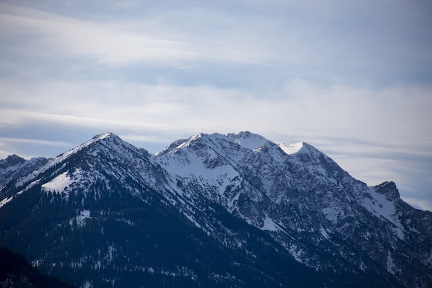 High alpine mountains with snow in Germany and blue beautiful sky