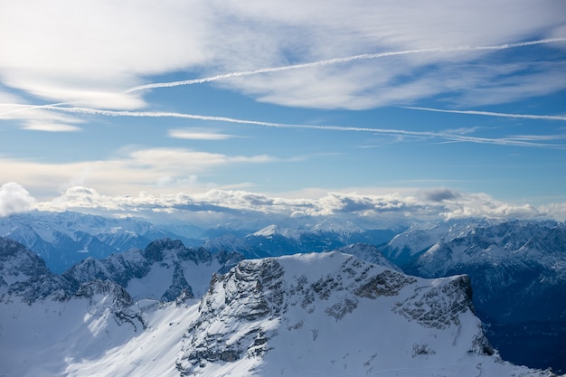 High alpine mountains with snow in Germany and blue beautiful sky