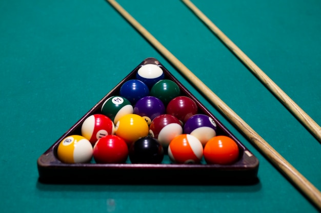 High angle arrangement with balls on pool table