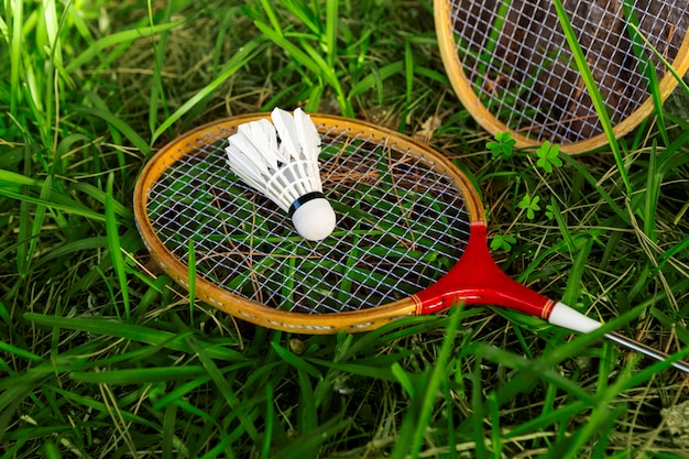 High angle badminton rackets on grass