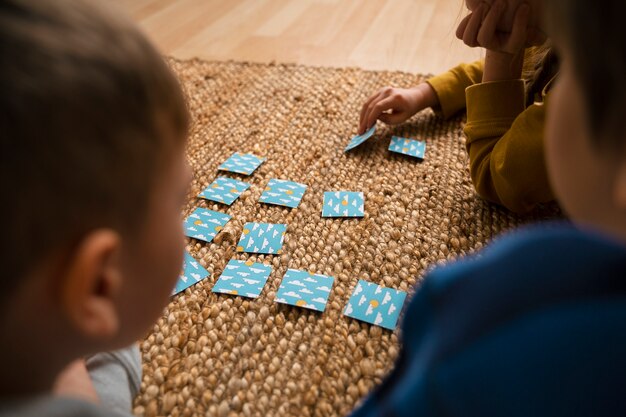 Photo high angle children playing memory game