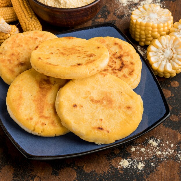 High angle delicious arepas on plate