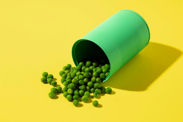 High angle green tin can with peas