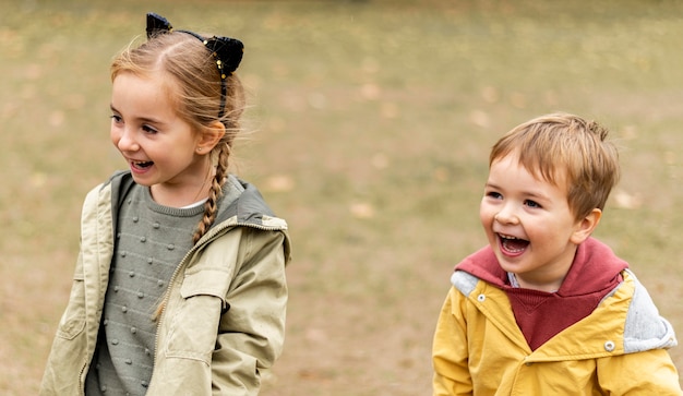 High angle happy kids outdoors