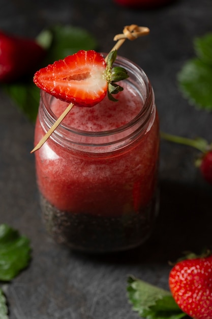 High angle jar with chia seeds and strawberry puree