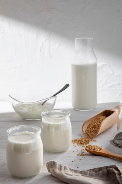 High angle milk glasses and bottle