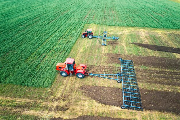 High angle shot of harvesters working in field