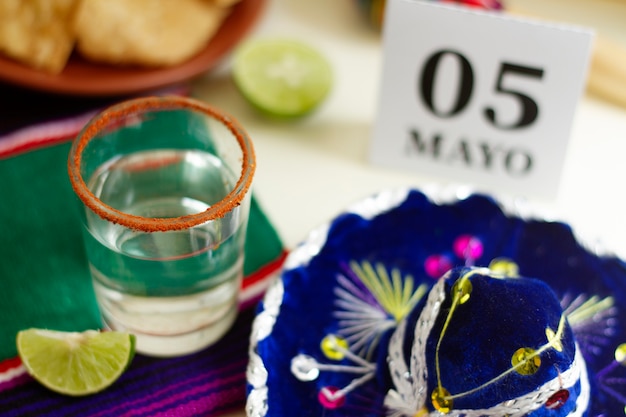 High angle sombrero and drink mexican party