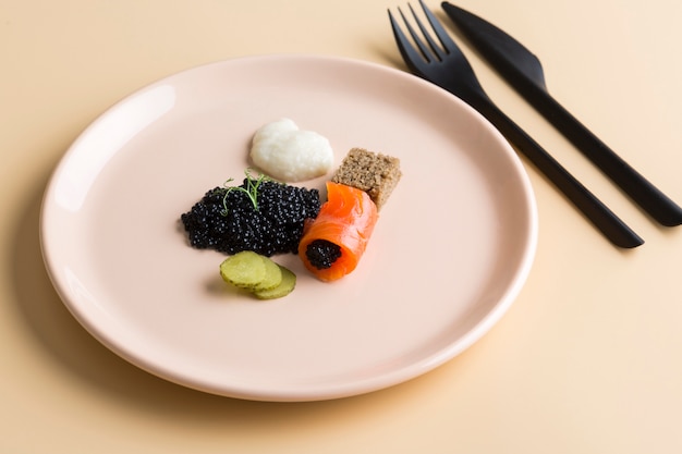 High angle tasty dish with caviar