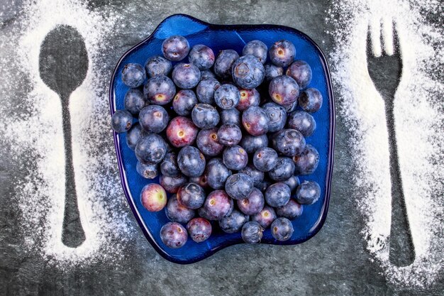 High angle view of blackberries in container