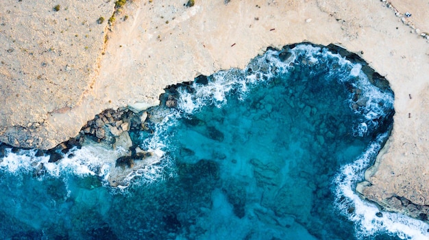 High angle view of blue sea shore