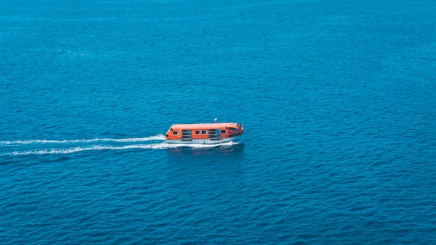 High angle view of boat sailing in sea