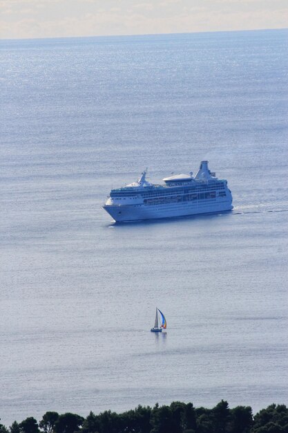 High angle view of boat sailing in sea