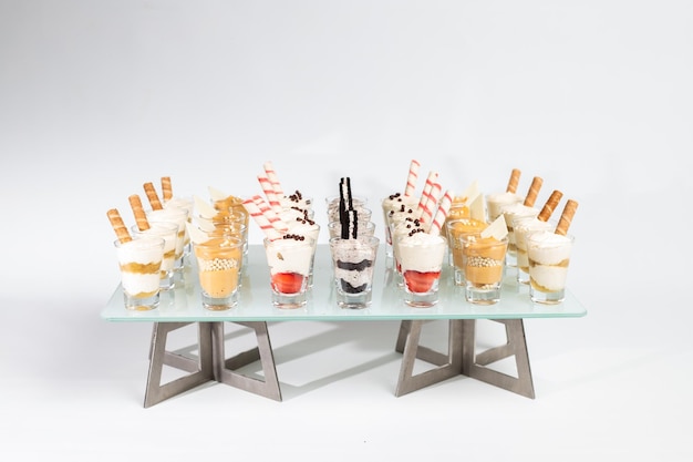 Photo high angle view of candies on table against white background