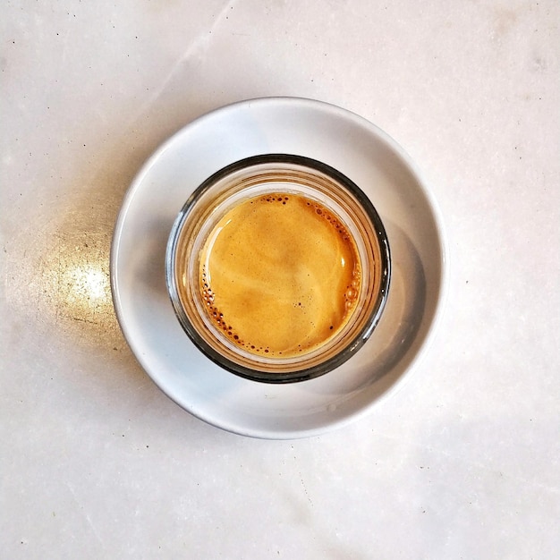 Photo high angle view of coffee on table