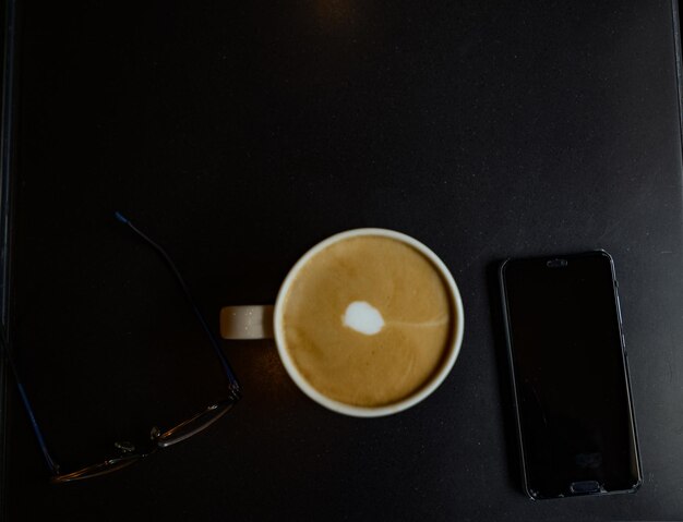 Photo high angle view of coffee on table