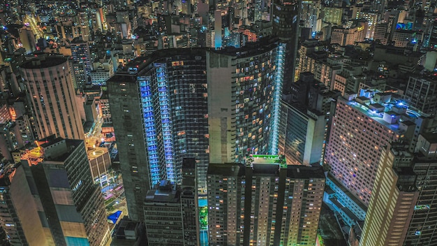 High angle view of illuminated buildings in city