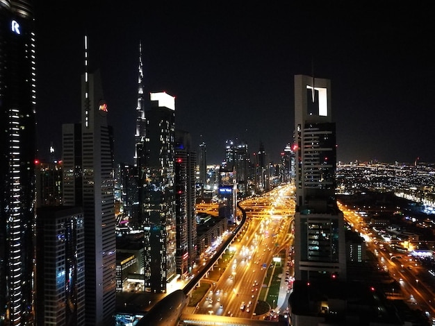 High angle view of illuminated buildings at night