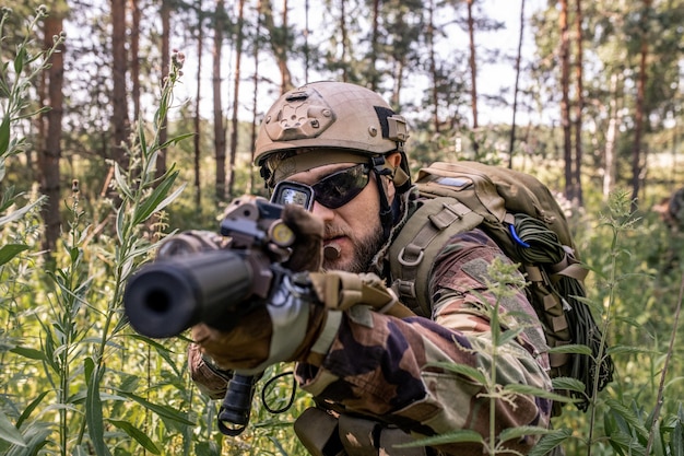 High angle view of modern army weapon on American flag, soldier equipment