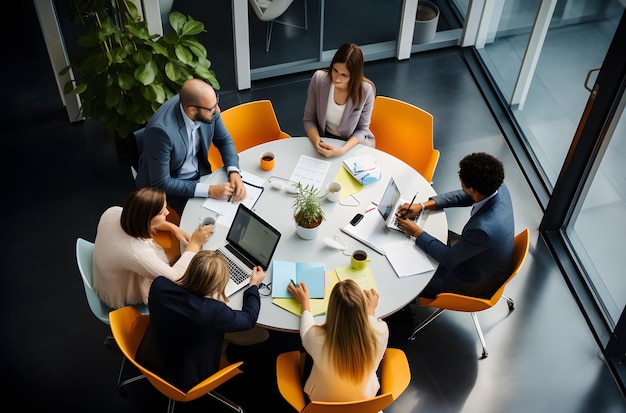 high angle view of multiethnic businesspeople working in conference room