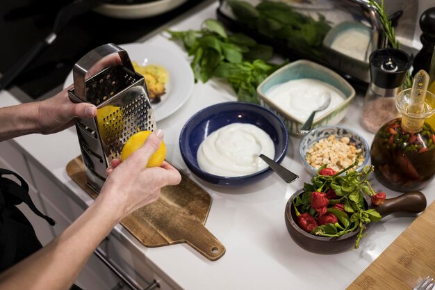 Photo high angle view of person preparing food on table