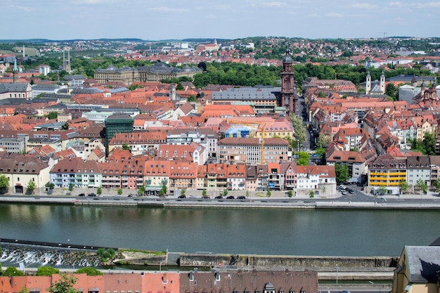 High angle view of river by buildings against sky