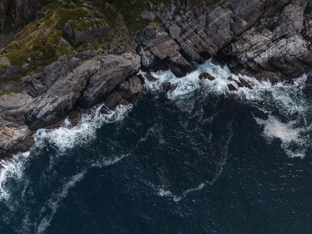 High angle view of rock formation in sea