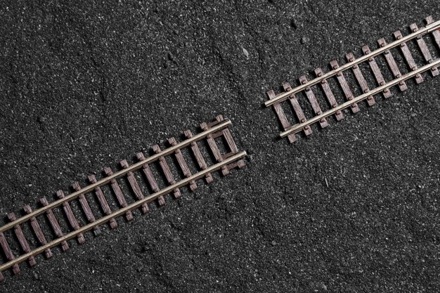 High angle view of tire tracks on road