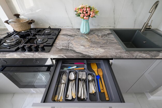 High angle view to white modern domestic kitchen furniture and interior