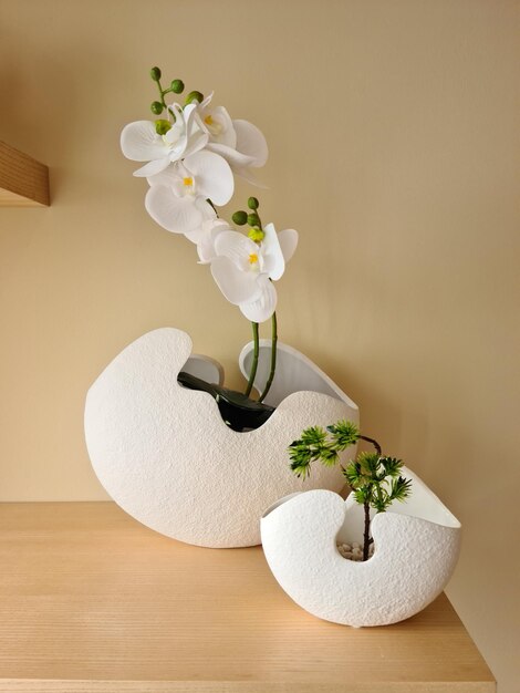 High angle view of white roses in vase on table