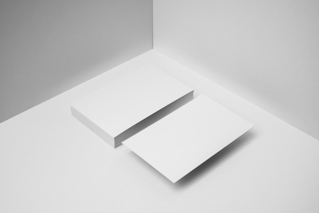 High angle view of white visiting card against wall