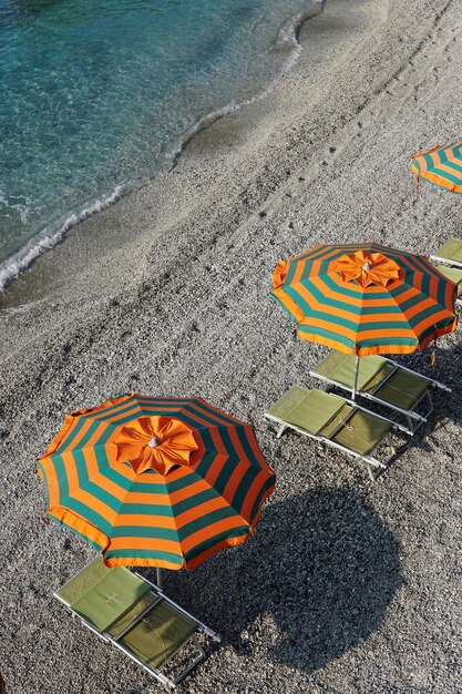 High angle view of yellow umbrella on beach