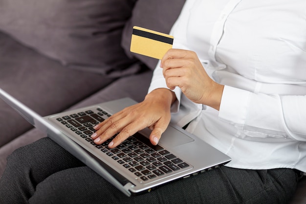 High angle woman buying things online