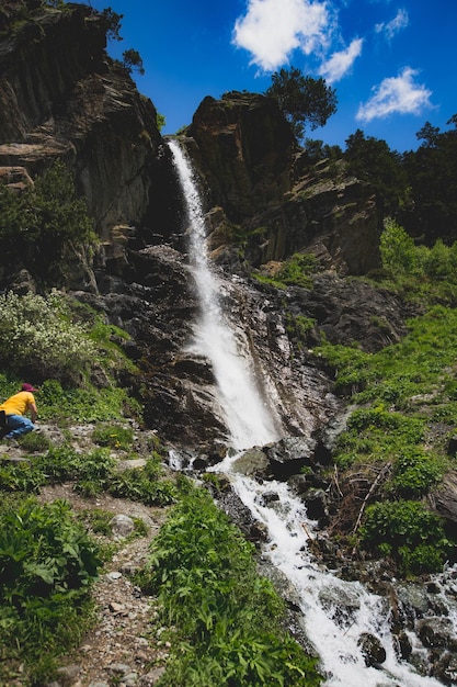 High beautiful waterfall on the Caucasus Mountains