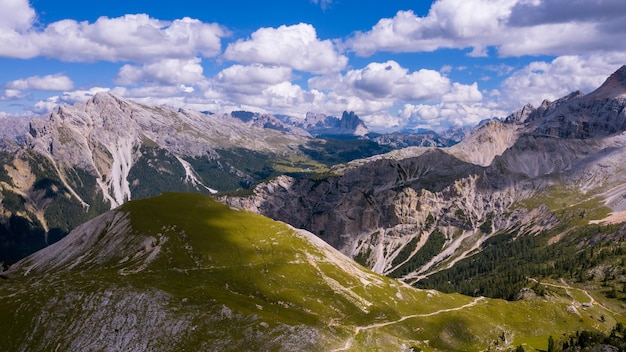 High cliffs Alps in Italy South Tyrol Dolomites Mountain landscape Shooting from a drone aerial pho